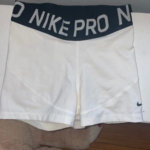 White Nike pro compression shorts